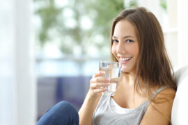 Girl drinking a glass of water