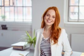 Businesswoman standing in an office setting